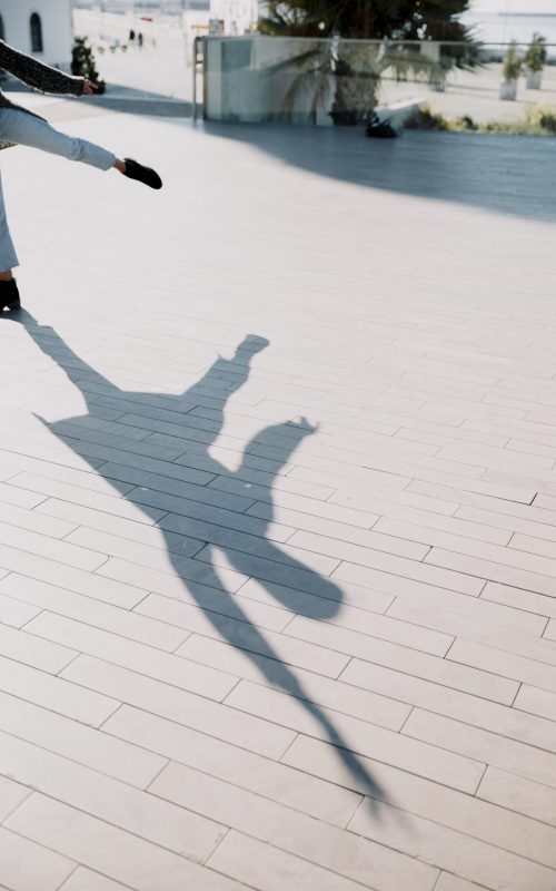 shadow-person-stretching-leg
