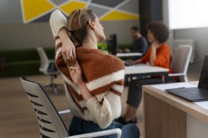 woman-office-stretching-work-day (1)